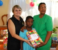 Orphan in the Bon Repos orphanage receiving their Make Jesus Smile shoeboxes 